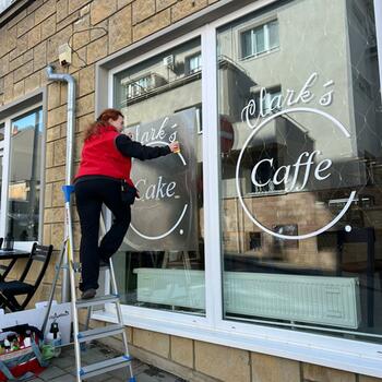 Reference: Clark´s neonový nápis